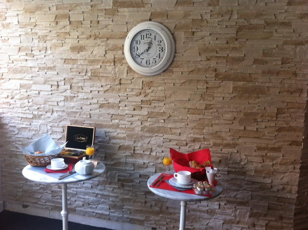 Le Monopole Hotel Reims Bagian luar foto