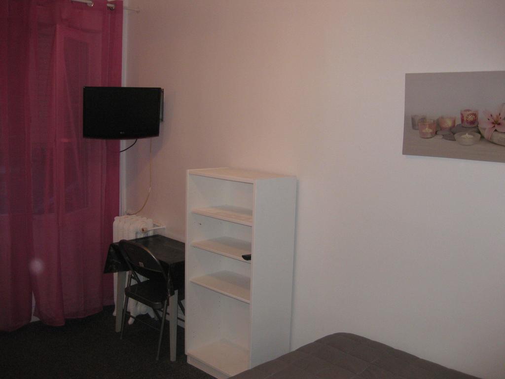 Le Monopole Hotel Reims Ruang foto