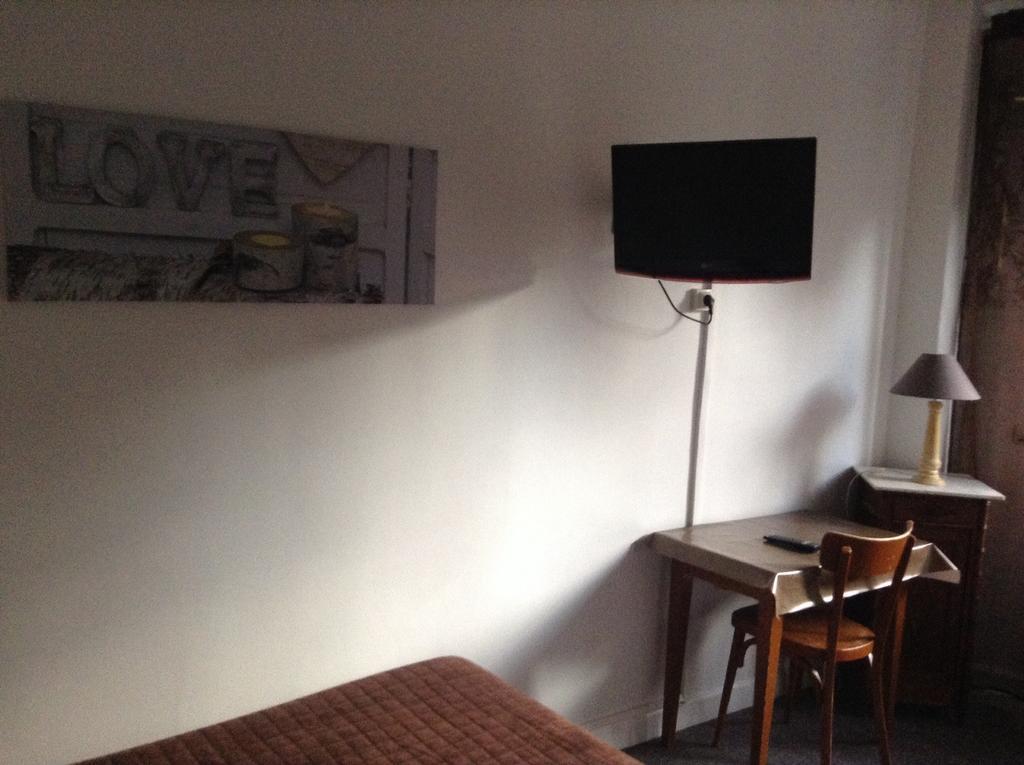 Le Monopole Hotel Reims Ruang foto