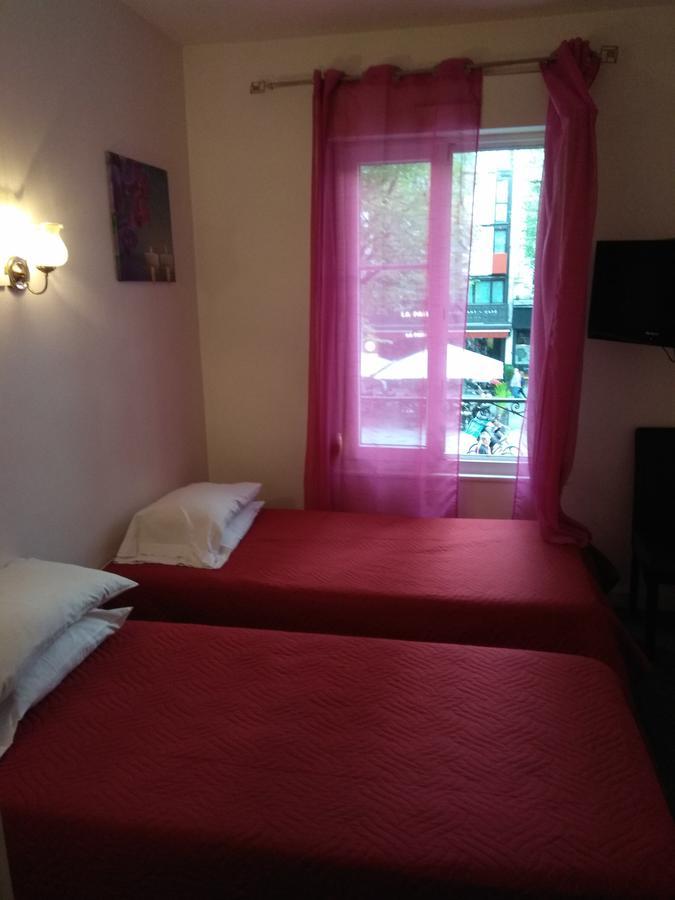 Le Monopole Hotel Reims Bagian luar foto