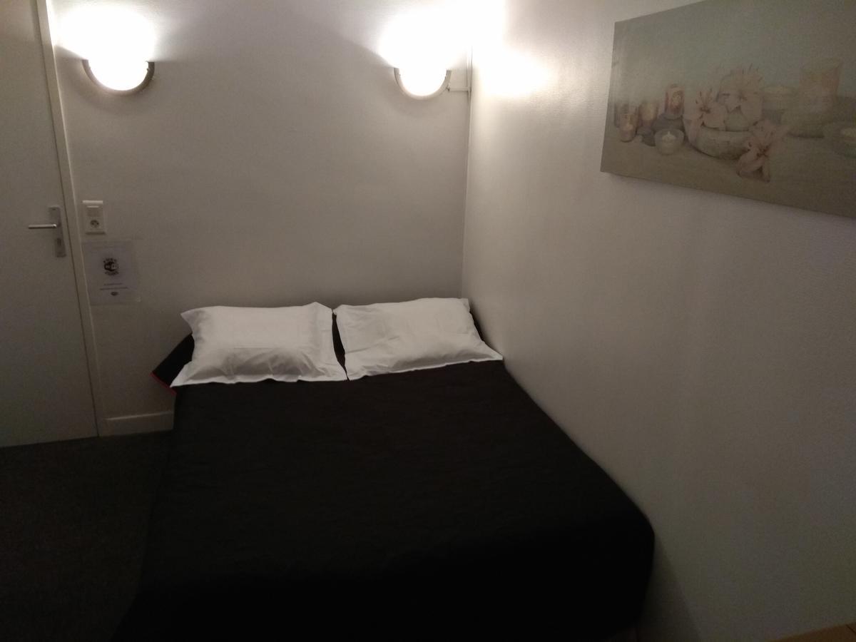 Le Monopole Hotel Reims Bagian luar foto