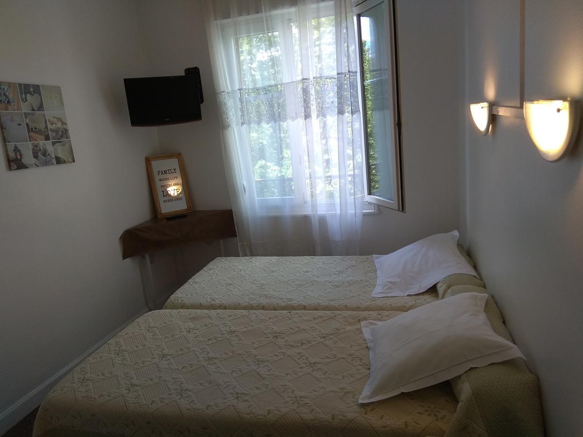 Le Monopole Hotel Reims Bagian luar foto