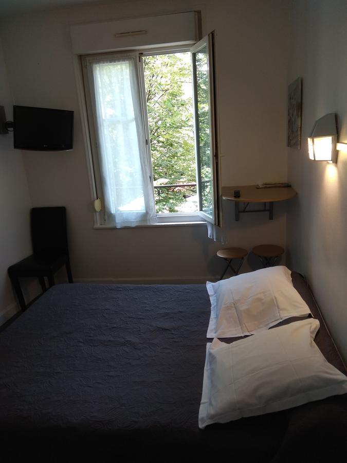 Le Monopole Hotel Reims Bagian luar foto