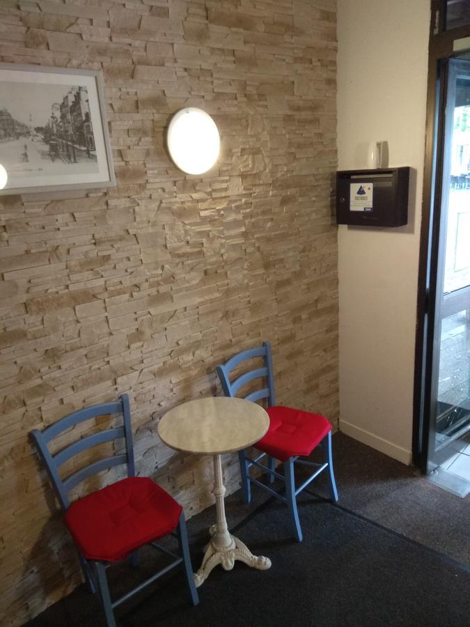 Le Monopole Hotel Reims Bagian luar foto