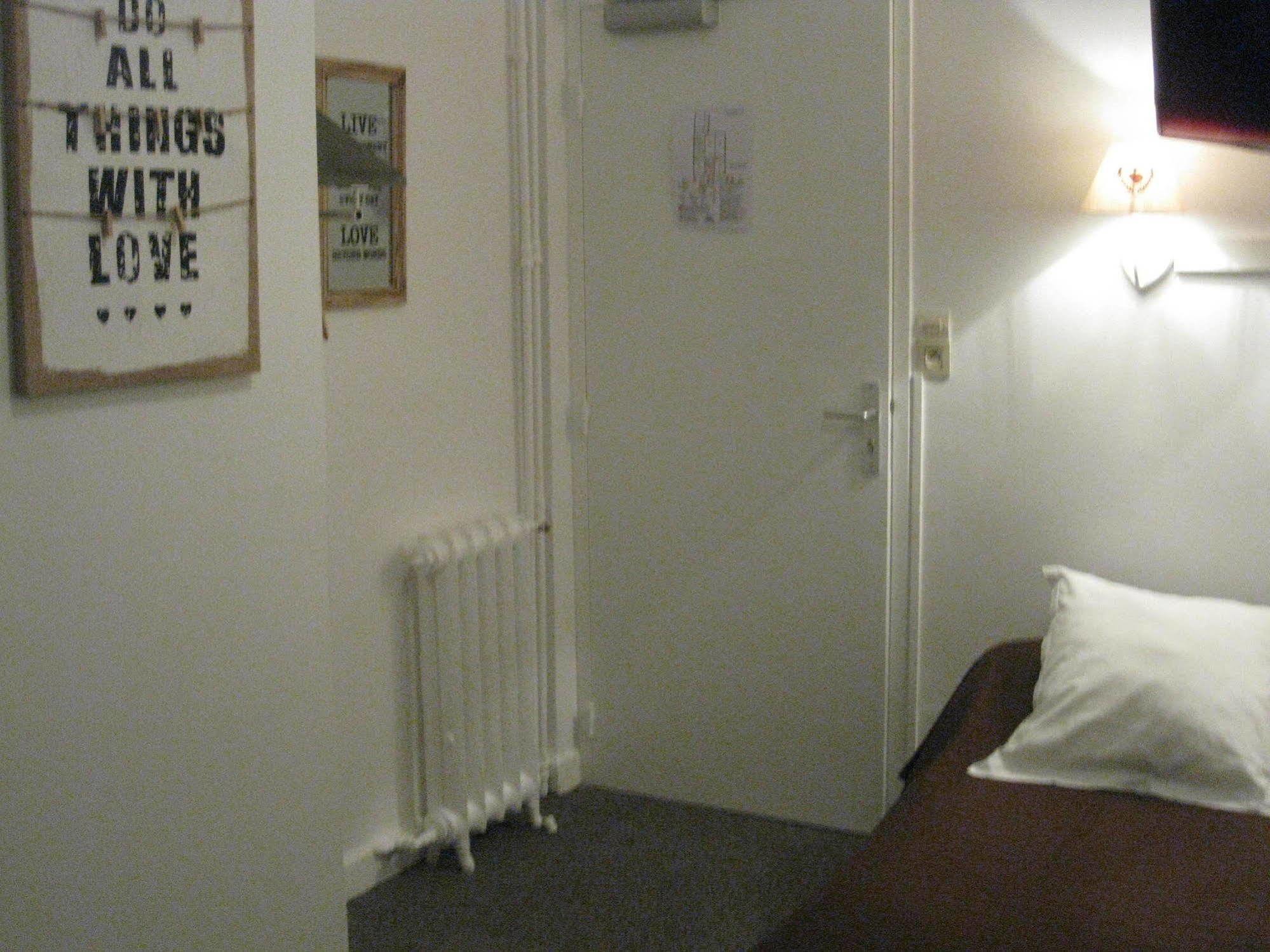 Le Monopole Hotel Reims Bagian luar foto