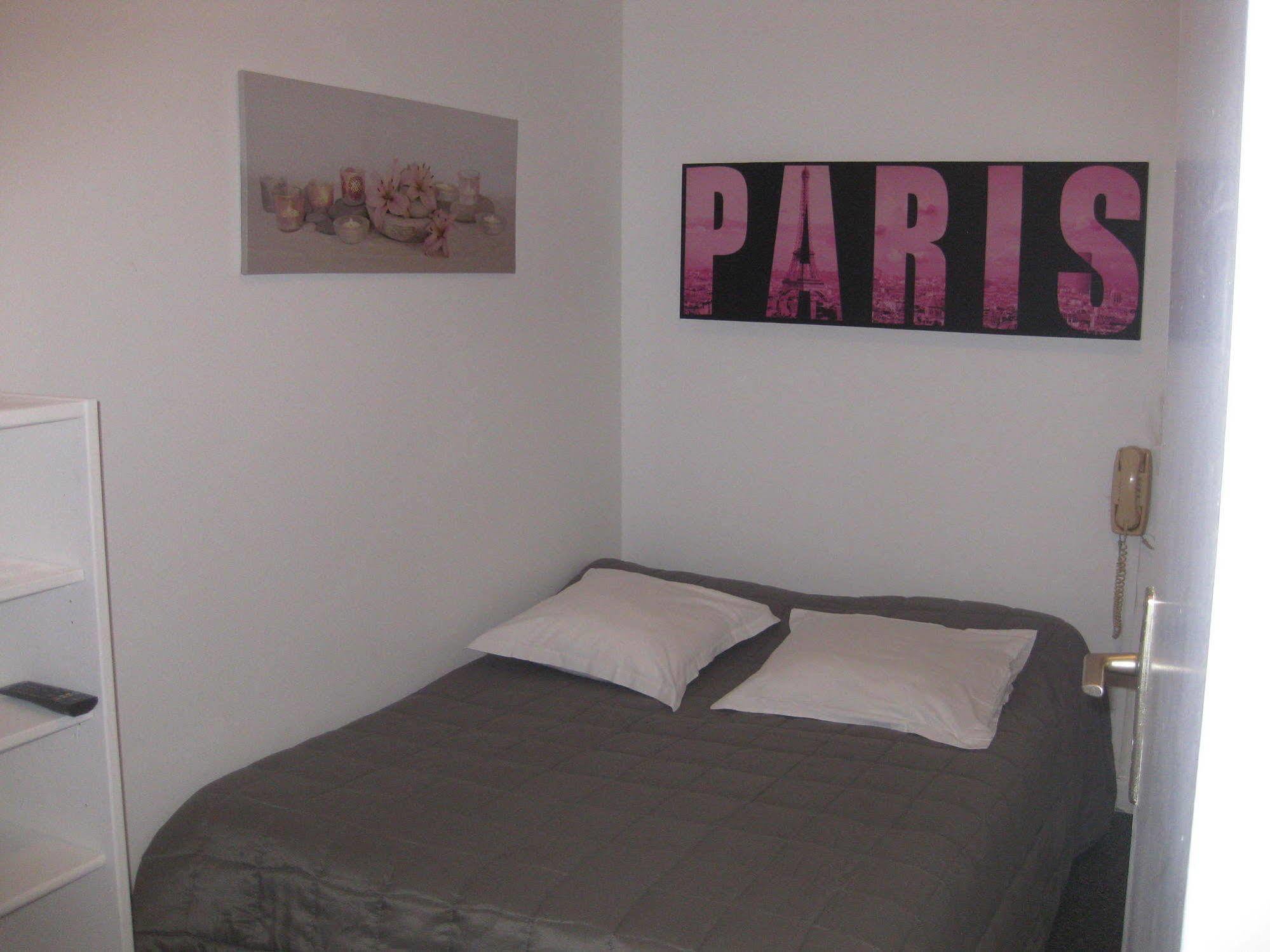 Le Monopole Hotel Reims Bagian luar foto
